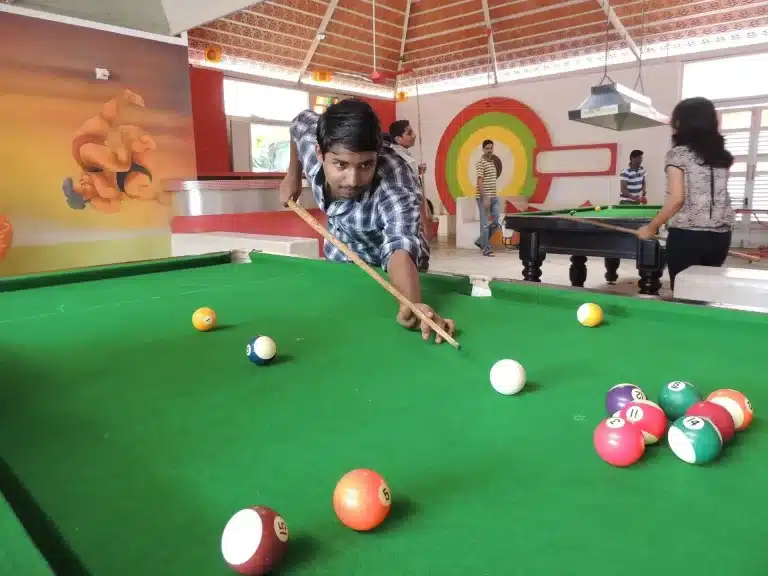 Descenders playing pool
